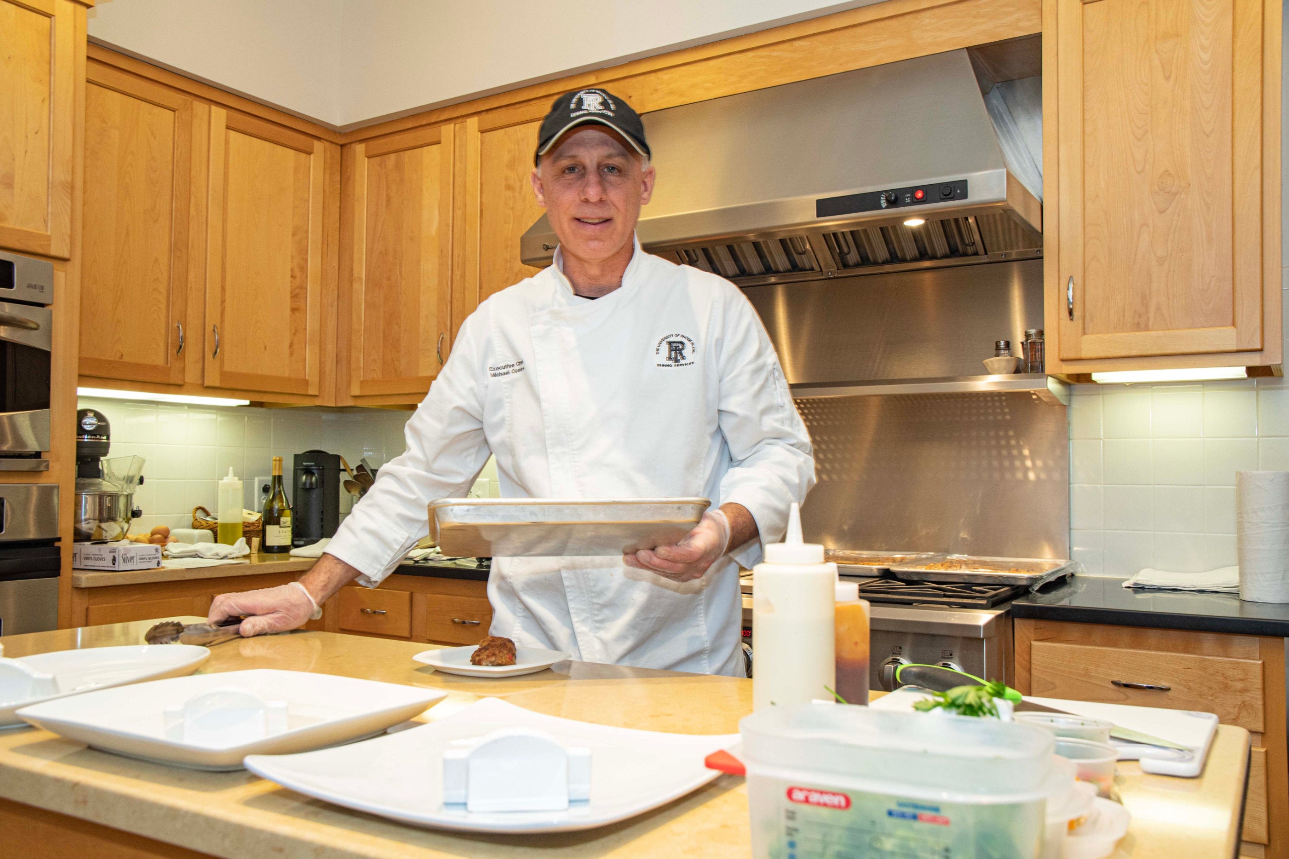 Chef Mike Comire in the kitchen of President Parlange's house