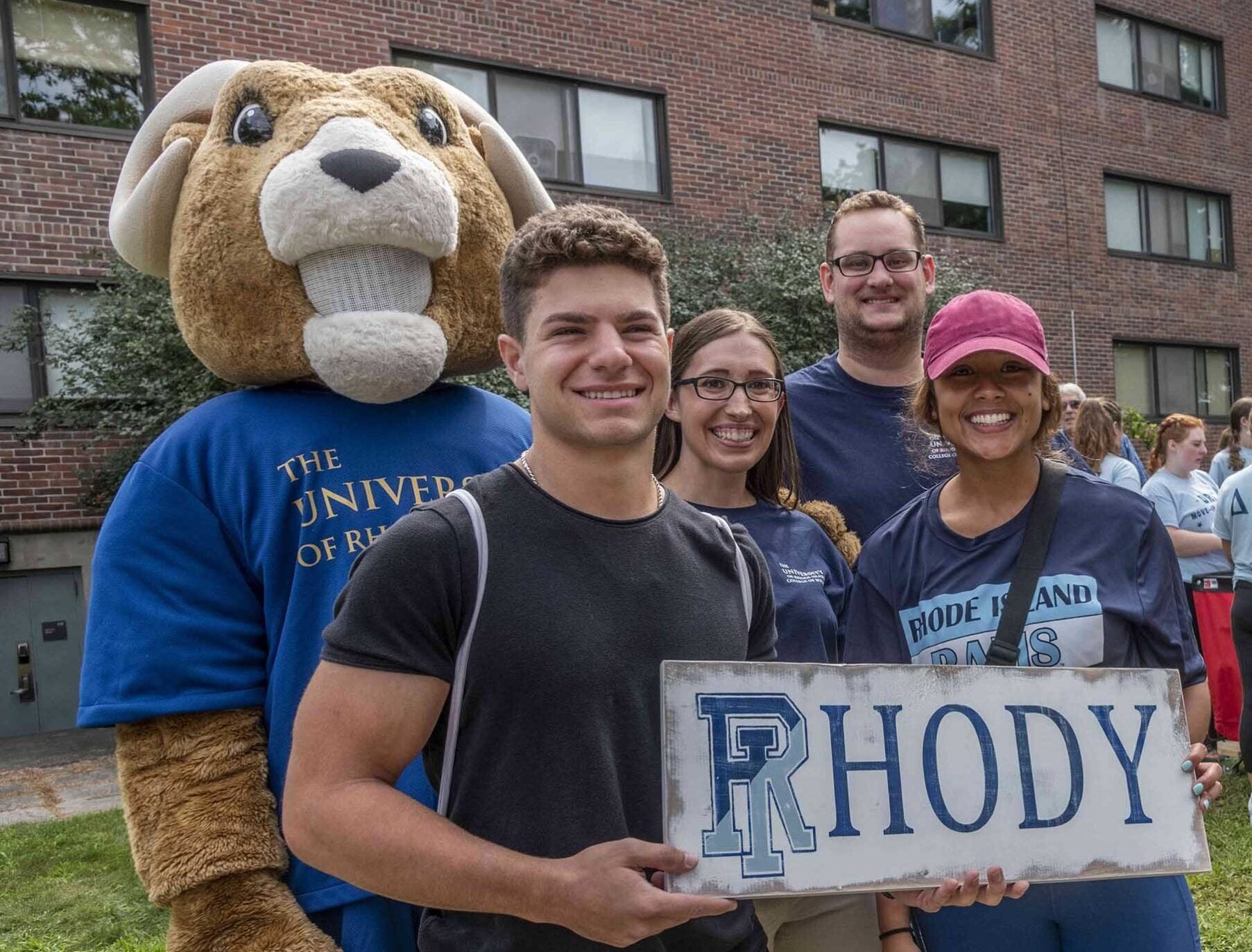 New URI students with Rhody the Ram mascott on move-in day