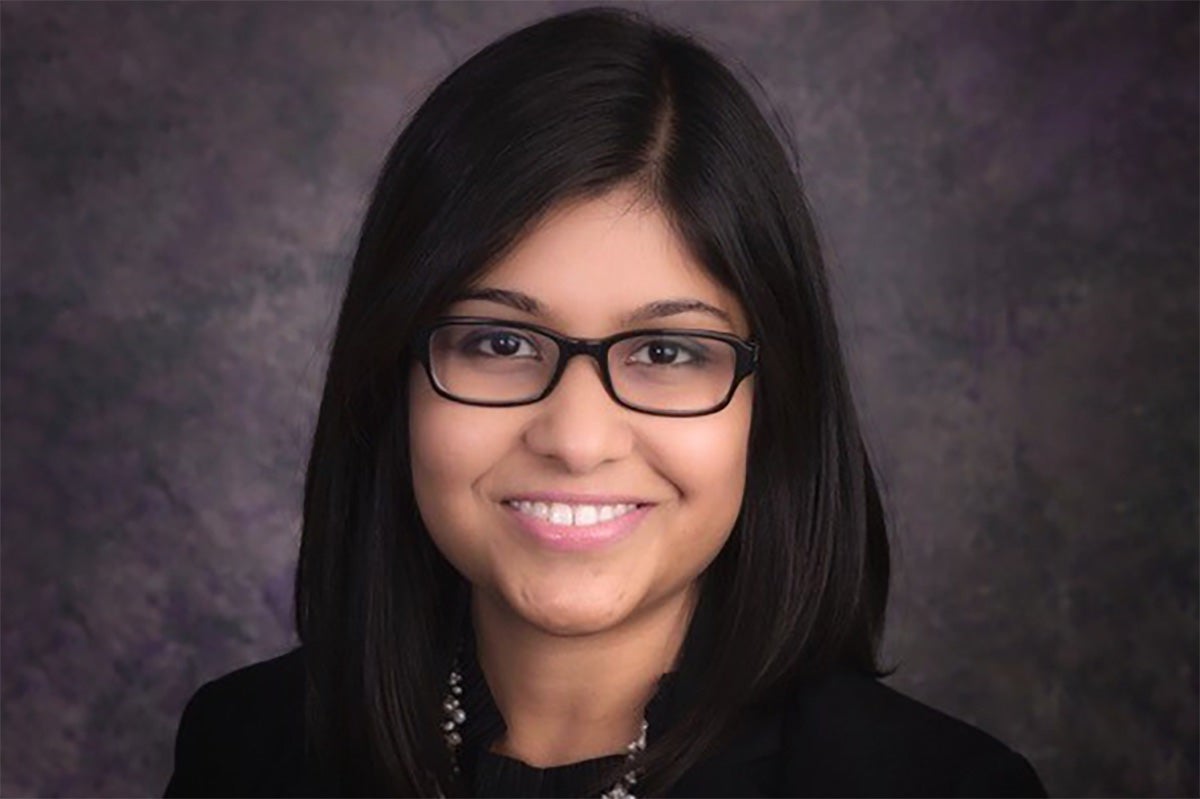College of Business faculty photo, woman wearing glasses