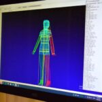 computer screen with colorful i3D image of the human body