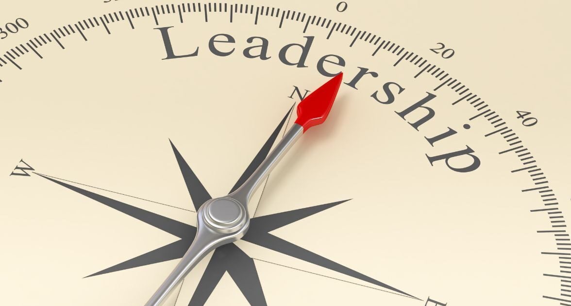 compass pointing to the word leadership
