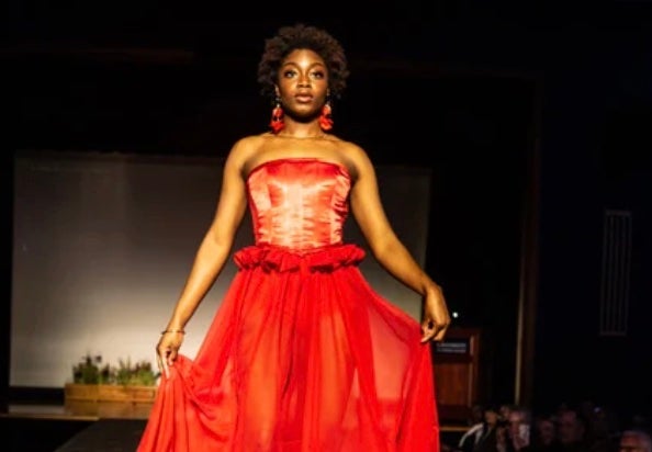 URI student in a red dress