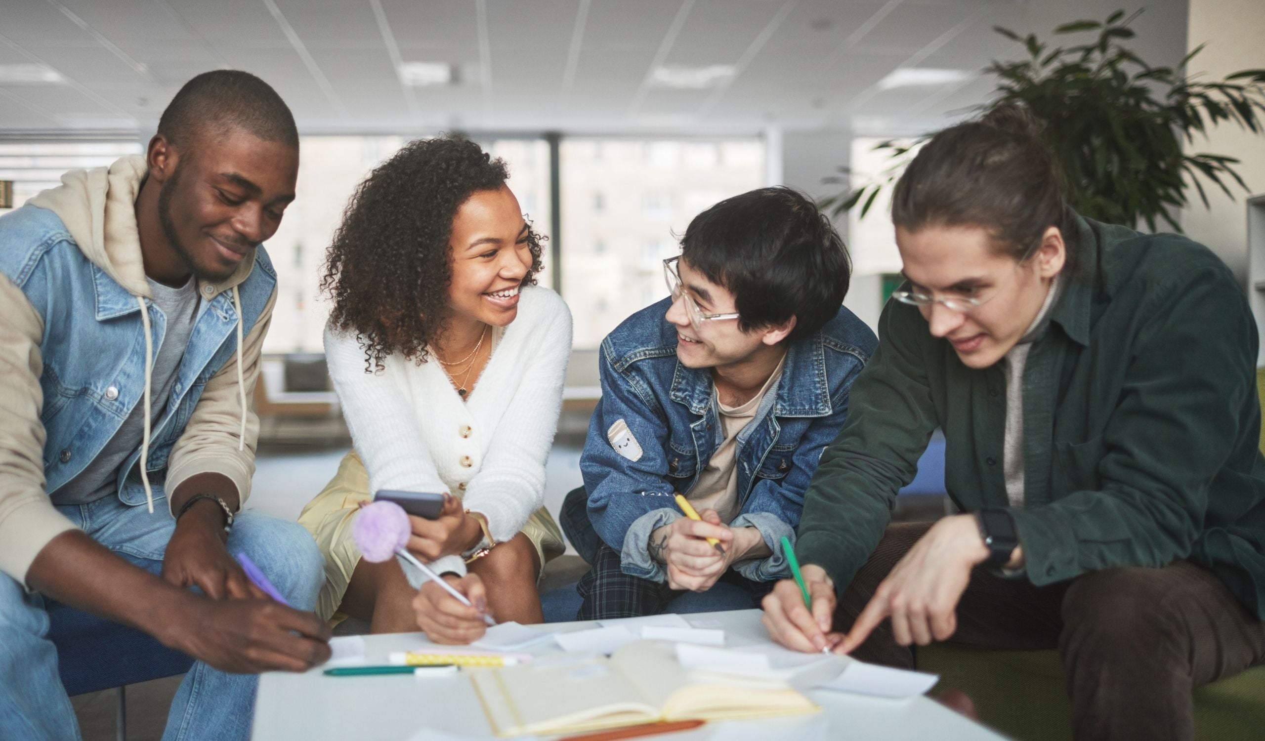 a group of business students studying together