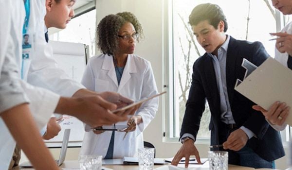 a healthcare management team makes decisions together