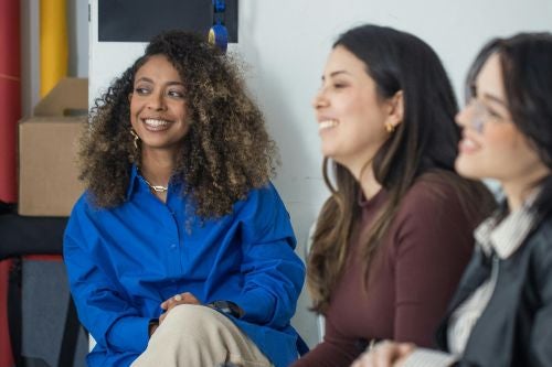 professional women sitting in a class