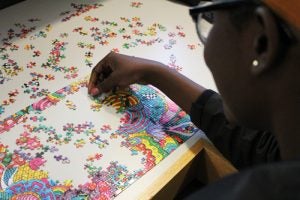 student doing a puzzle