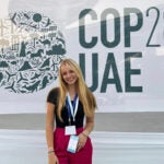 image of URI junior Kiersten Sundell smiling at the COP28 Conference in Dubai