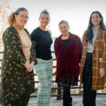 image of Rebecca Brown, scarecrow developer and professor and chair of plant sciences and entomology, of the URI College of Environmental and Life Sciences (CELS); Azure Cygler, PRESS project manager, a sustainable fisheries and aquaculture specialist of the URI Coastal Resources Center (CRC) and Rhode Island Sea Grant (Sea Grant); PRESS lead Marta Gomez-Chiarri, professor of aquaculture/fisheries in URI CELS; and Kassandra Florez, community affairs coordinator for U.S. Sen. Jack Reed. URI photos by Nora Lewis.