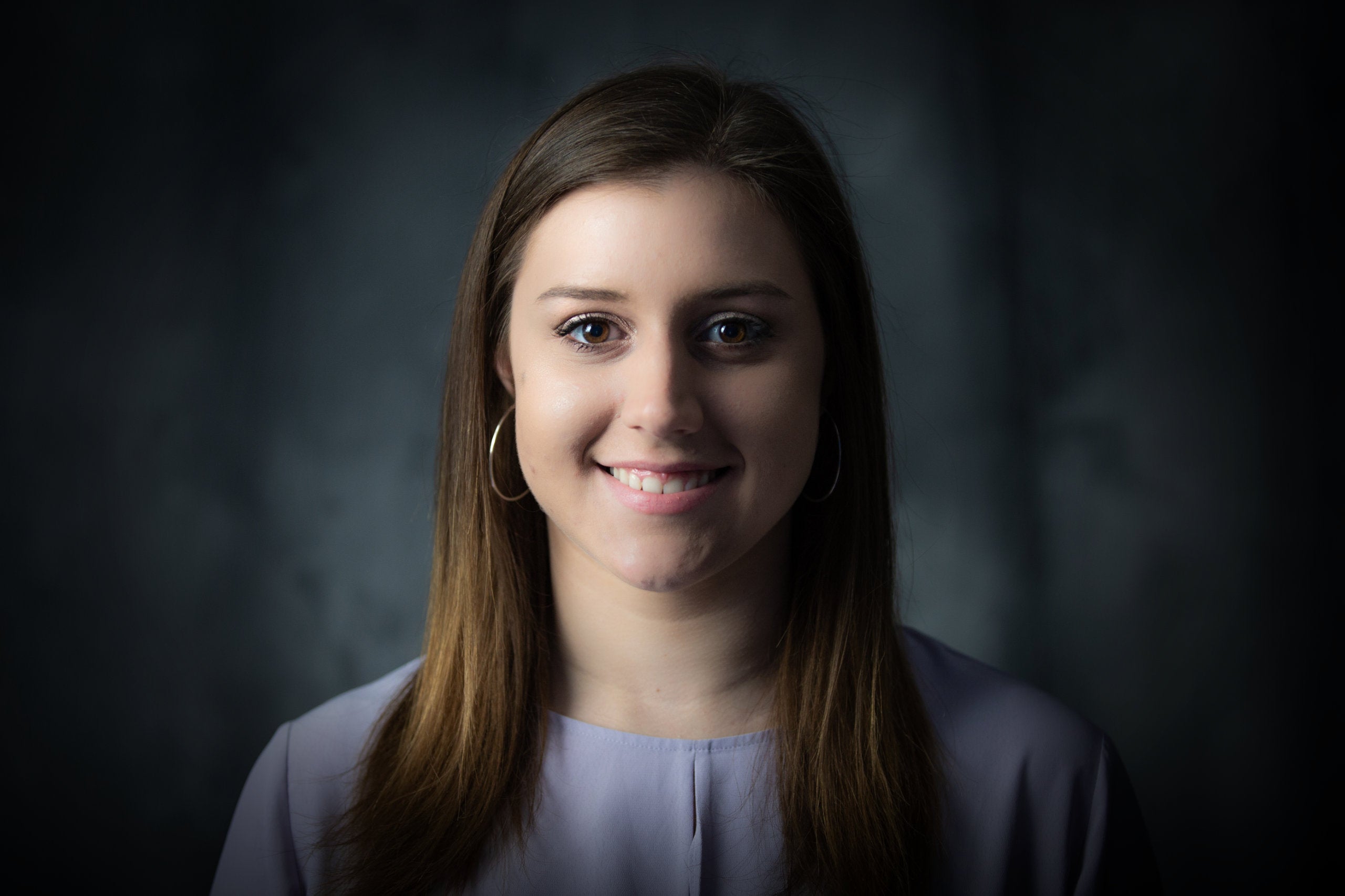 headshot of emily hadfield smiling