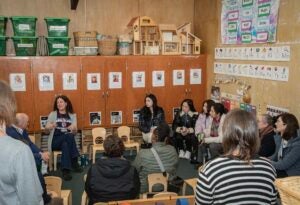 Jessica MacLeod, director of the Kingston Child Development Center, leads a discussion on laboratory schools in the on-campus preschool, while hosting the annual conference of the International Association of Laboratory Schools.
