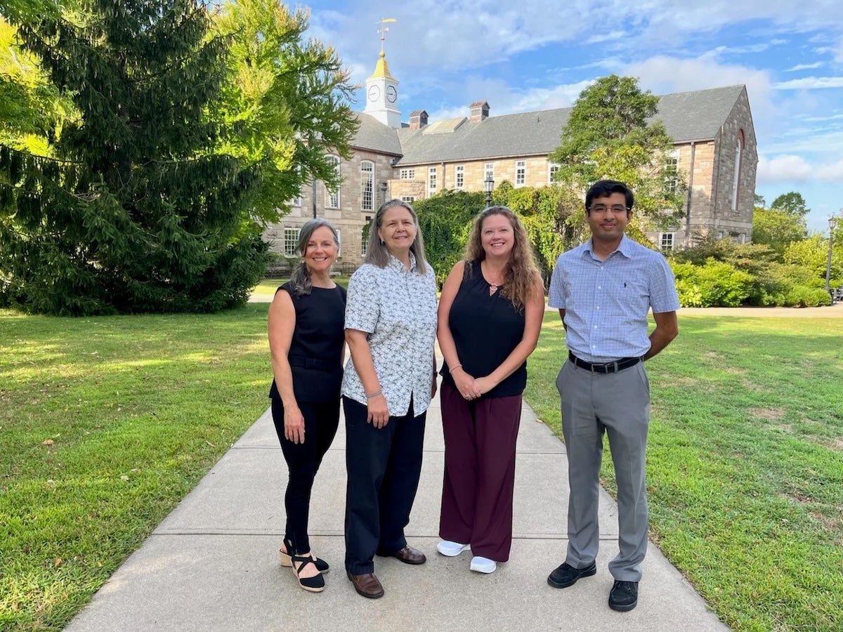 The grant spans three URI colleges—Engineering, Environment and Life Sciences, and Health Sciences—in addition to the Interdisciplinary Neuroscience Program. Shown, l-r: Lisa Weyandt, Lynda Stein, Jodi Camberg, Kunal Mankodiya.