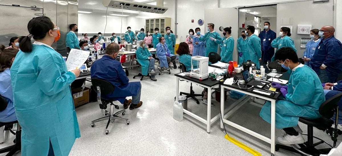 The research team at Kennedy Space Center confirming protocol and timing prior to receiving animals for post-flight sampling. The team included researchers, research assistants, and students from the United States and Japan.