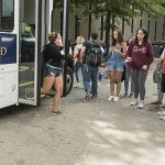 University Shuttle service picking up students