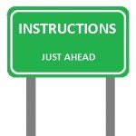 A photo of a road sign which reads "Instructions: Just Ahead".