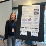 Crowley presents her poster at NEOSEC
