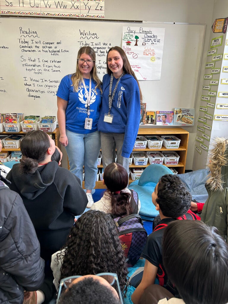 URI classmates, friends, and now co-teachers Emma Corcoran and Sadie Flynn are still smiling as they approach the final months of their first year of teaching fourth grade together.
