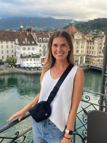 Heather poses with a backdrop of Lucerne 