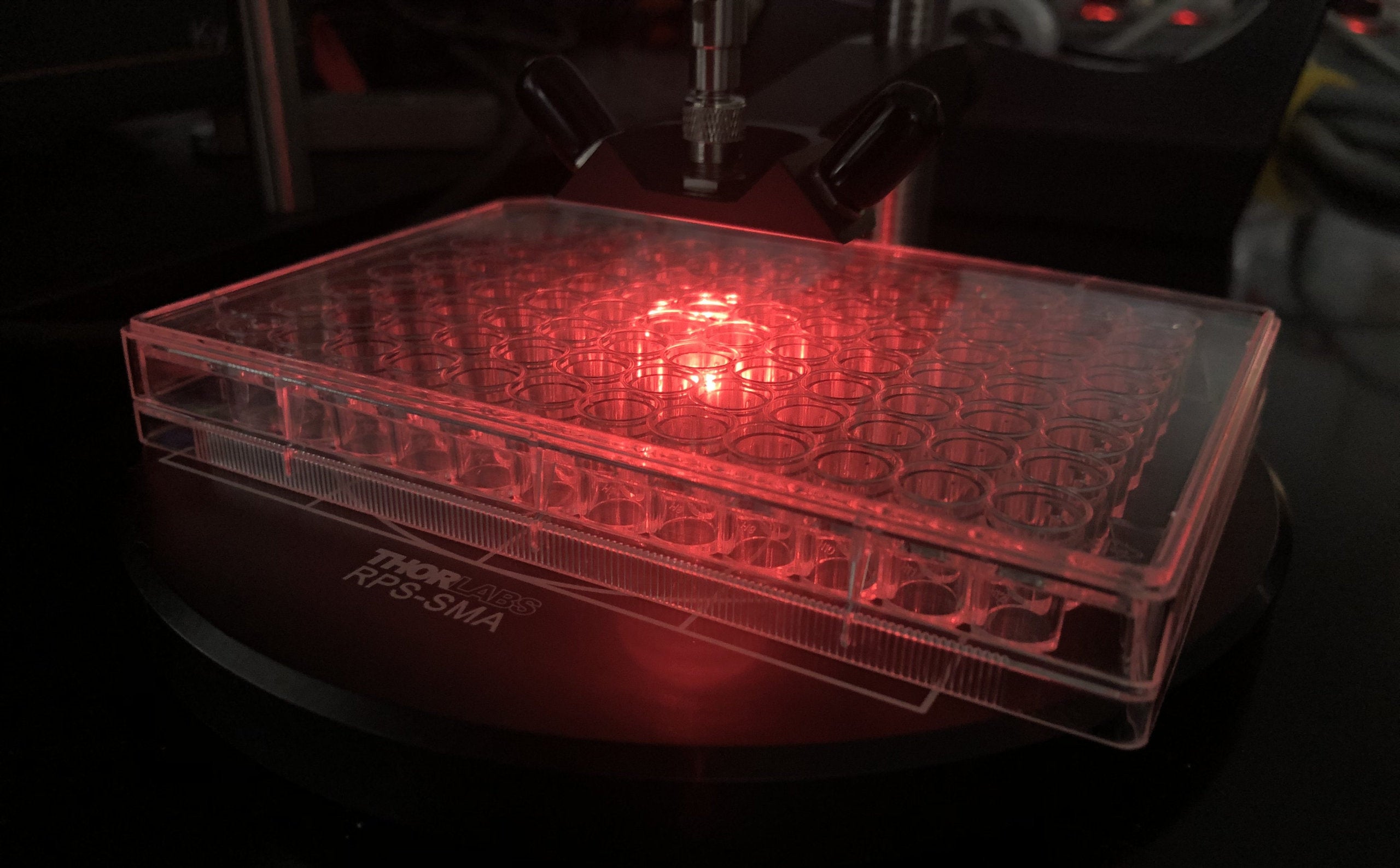 An image of illuminating laboratory equipment from the URI NanoBio Engineering Laboratory