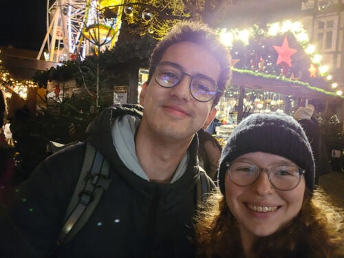 Two friends at a Christmas market in Germany