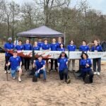 ASCE 2026 team pose for a group photo with their concrete canoe