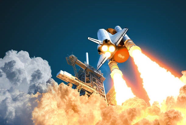 space shuttle taking off