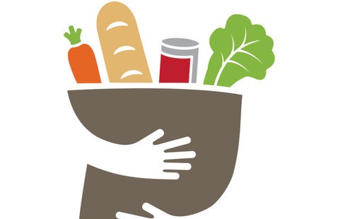 hands holding a bag of food.