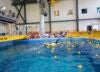ROV Lil Rhody in the pool, with rubber ducks.