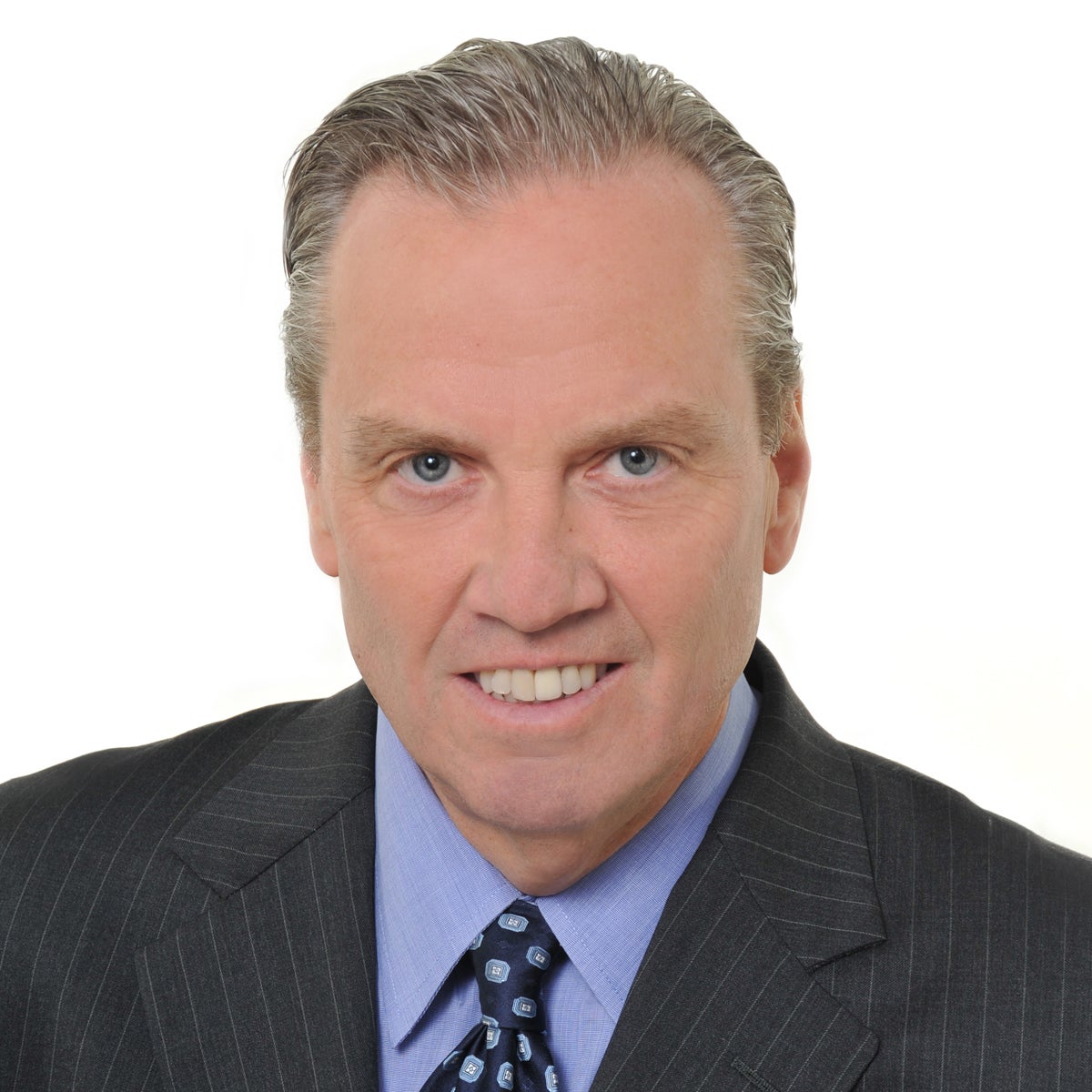 Headshot of Gus Carlson on a white background