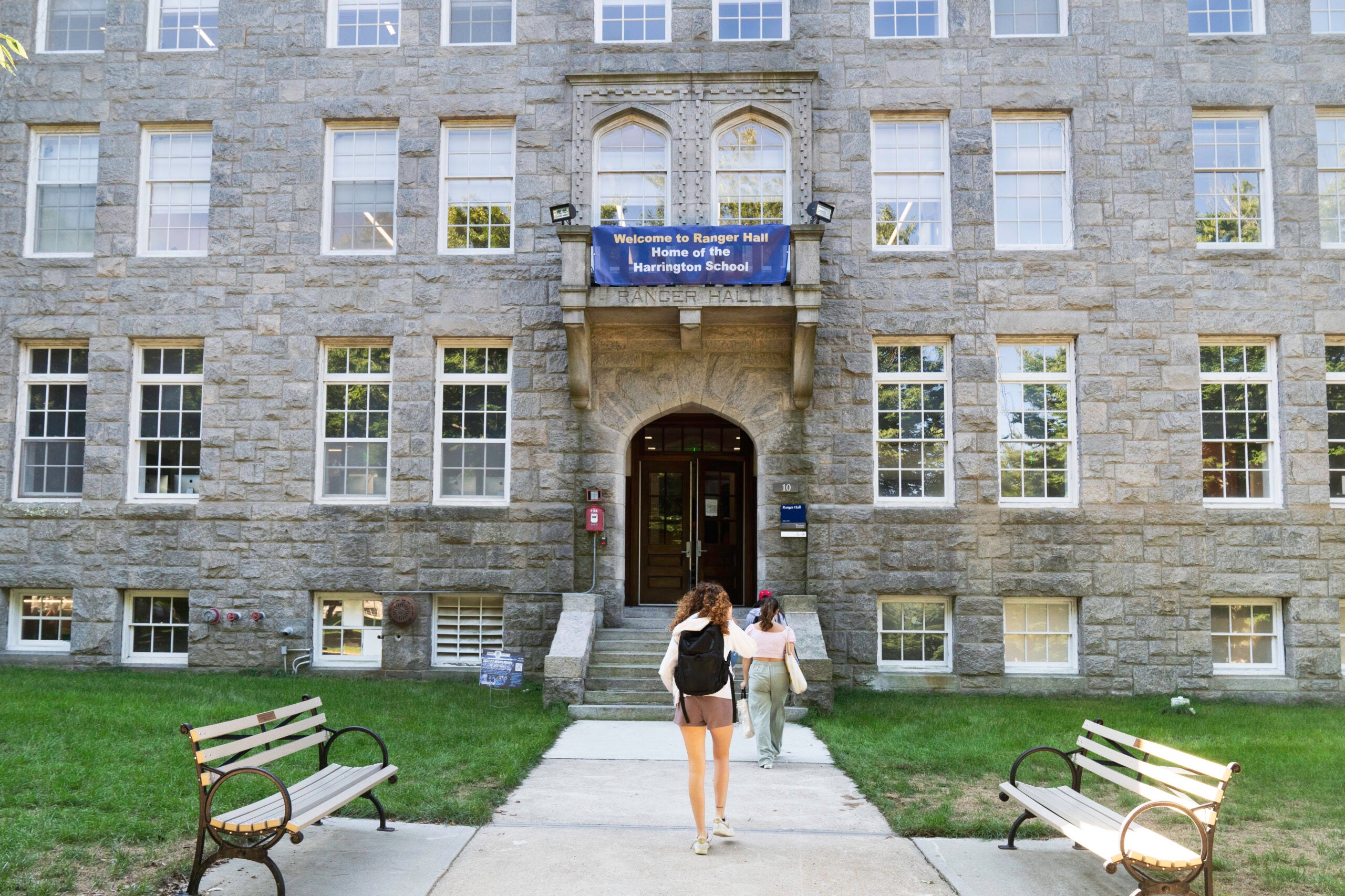 Exterior of Ranger Hall with students entering the building