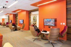 Students sitting in the viewing area of the newly renovated Harrington Hub in Ranger Hall.