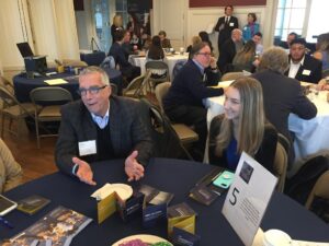 Students network with Harrington Board members