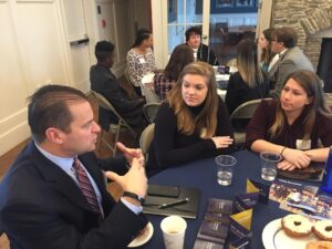 Harrington Board member speaks to students at networking event