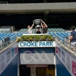 Students studying abroad in Ireland pose with a trophy during a visit to Croke Park in Dublin.