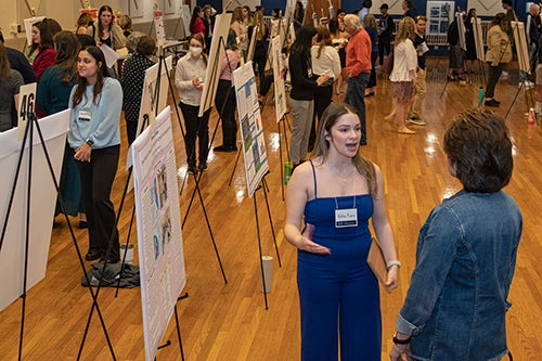 Students presenting their honors projects at annual conference