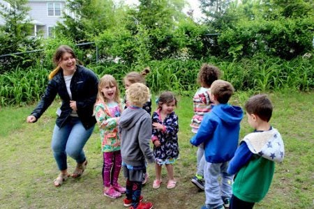 HDF student with group of young children