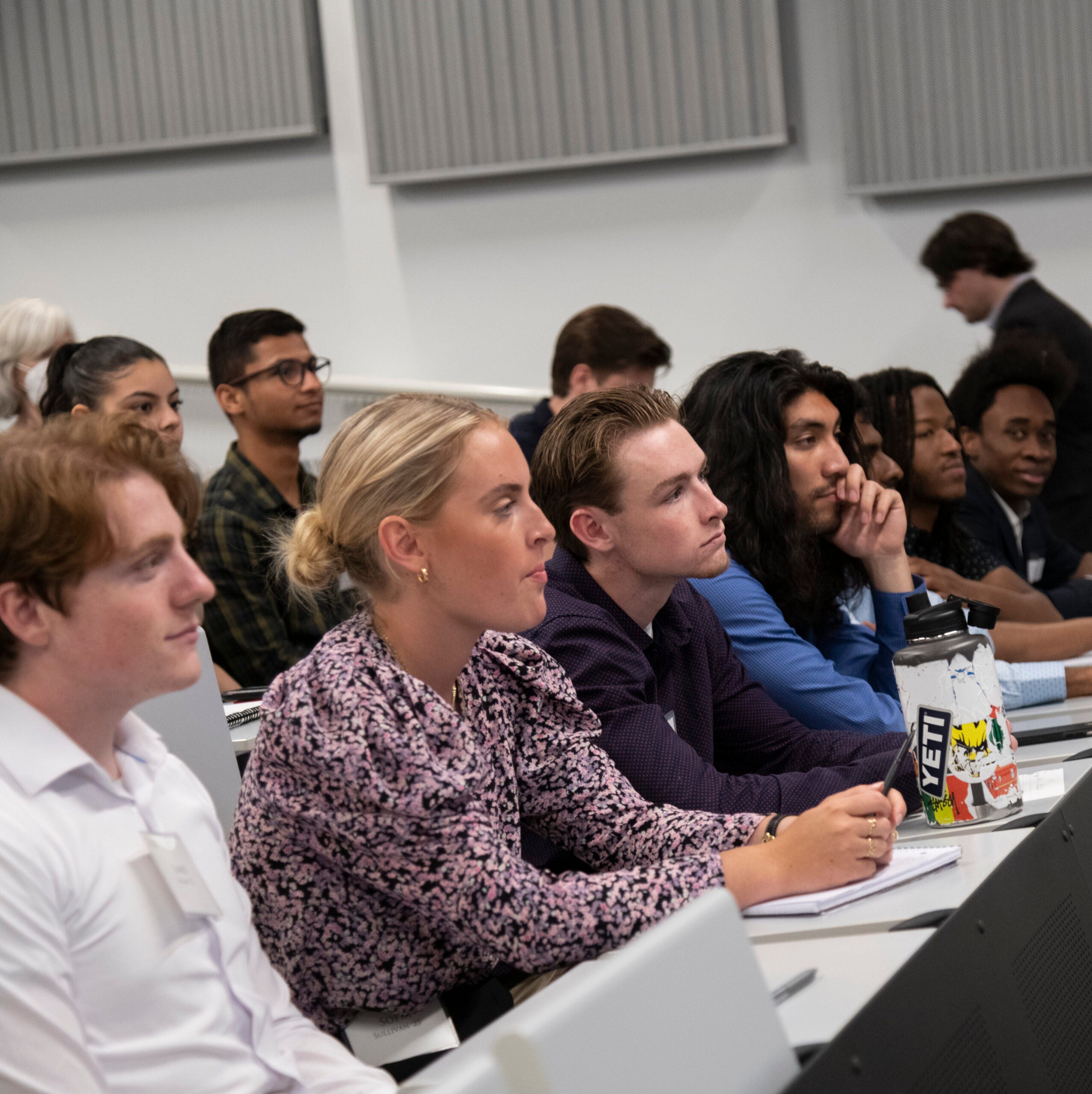 Students sitting at desk, business accelerator