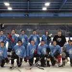 Hockey Intramural team posing for a team picture in the Boss Ice Arena