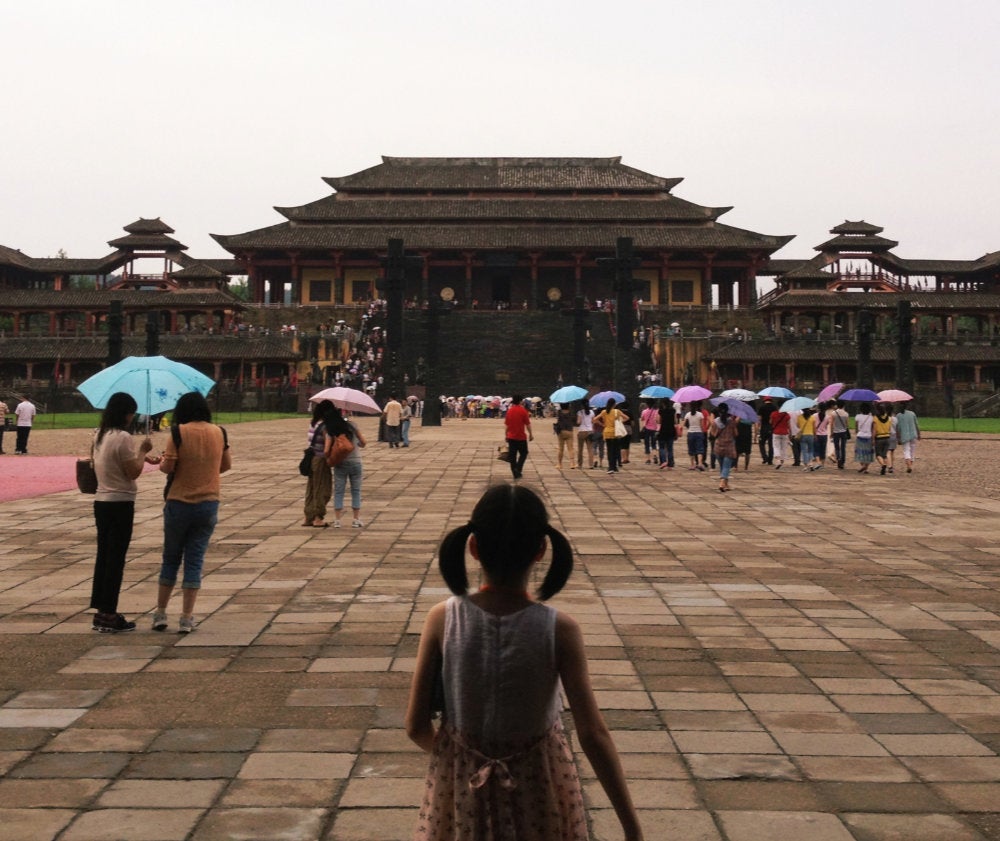 A crowd in front of a Chinese temple