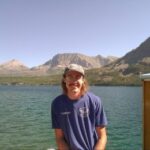 Grayson next to water