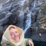 Haley next to a waterfall