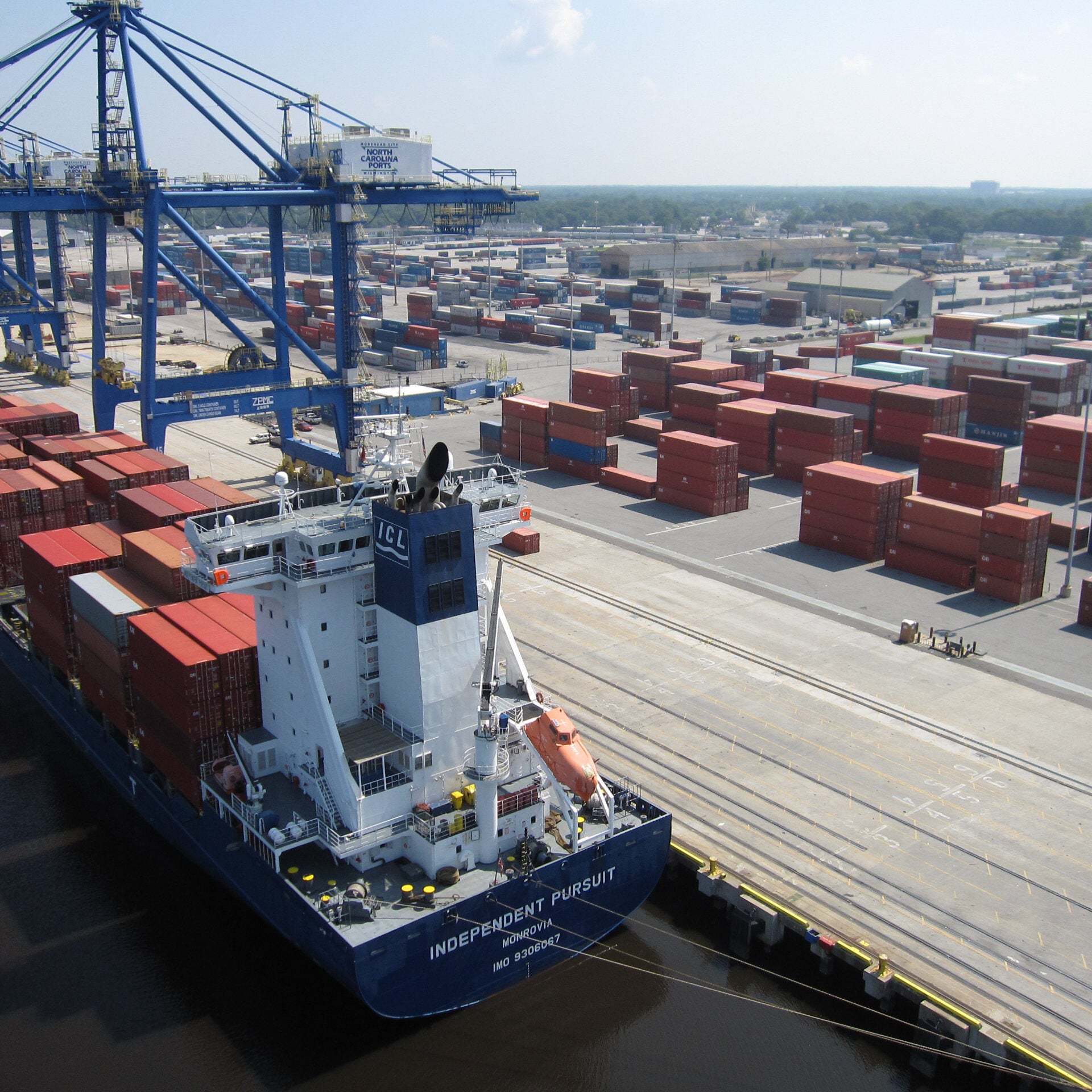 A large ship loaded with containers at a port in Wilmington, Delaware