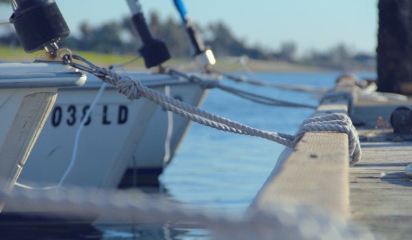Boats tied to a dock