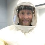 Dr. Jacob Bueno de Mesquita suited up to take COVID-19 samples