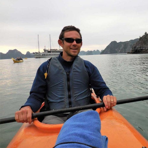 Natural Resources Science faculty member, Brian Gerber in a kayak