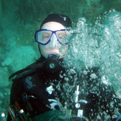 Natural Resources Science faculty member, Graham Forrester underwater, wearing scuba gear