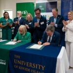 URI President Marc Parlange and CCRI President Rosemary Costigan sign an agreement between the two schools on a fully online Registered Nurse to Bachelor of Science (RN-to-BS) program during a signing ceremony on Oct. 1.