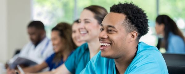 a nursing student sitting in a classroom