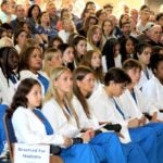 Second-year URI College of Nursing students were officially welcomed into the nursing profession during the semi-annual White Coat Ceremony on Sept. 8.