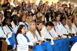 Second-year URI College of Nursing students were officially welcomed into the nursing profession during the semi-annual White Coat Ceremony on Sept. 8.
