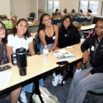 Students in the Pathways to Nursing Program at the University of Rhode Island gather for a welcome reception Sept. 17 in White Hall, home of the URI College of Nursing.